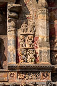 The great Chola temples of Tamil Nadu - The Airavatesvara temple of Darasuram. Panel with dwarf attendant figures flanking the niches on the south wall of the sanctuary. 